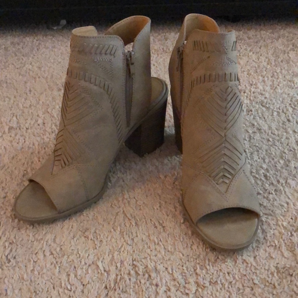 Tan heeled open back and toe booties